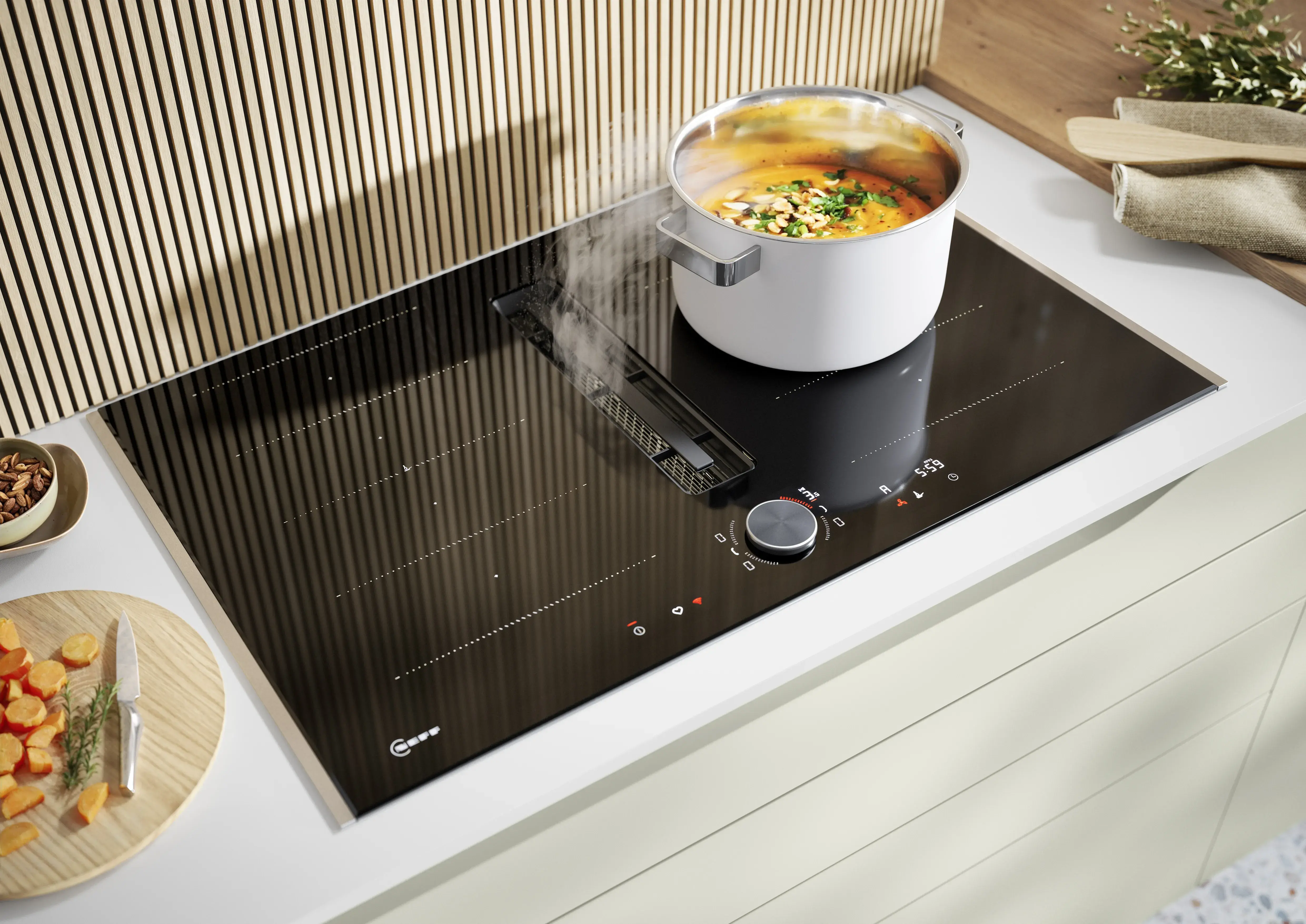 NOBILIA Jadegrün mit Fokus auf Neff Kochfläche